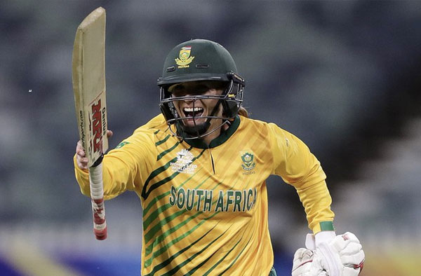 Mignon Du Preez celebrates after winning the match against England