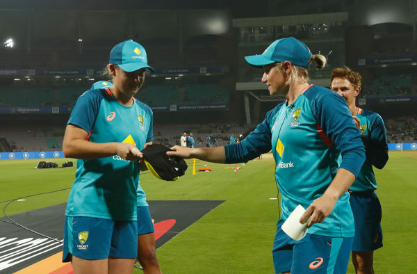 Alyssa Healy handing over debut cap to Phoebe. PC: NSWCricket / Twitter