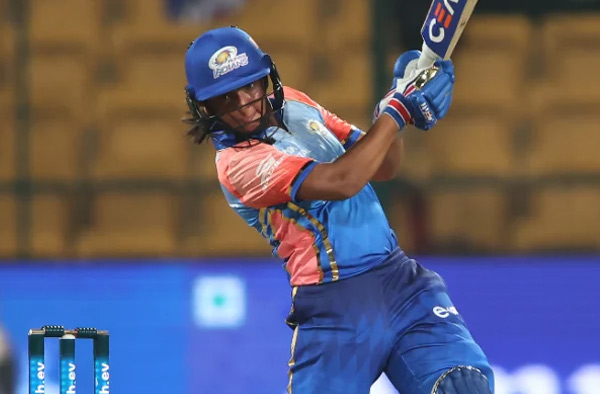 Harmanpreet Kaur leads Mumbai Indians to a thriller against Delhi Capitals.